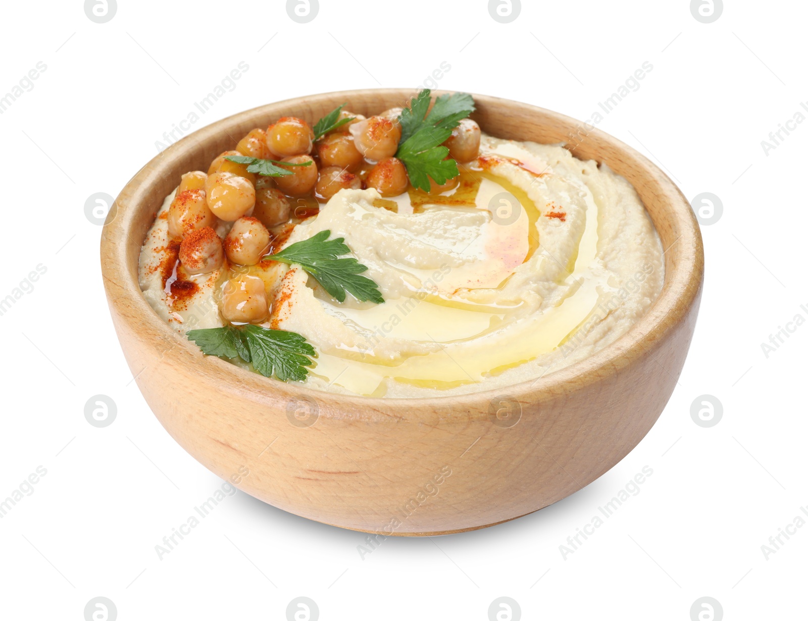 Photo of Delicious hummus with olive oil, chickpeas and parsley isolated on white