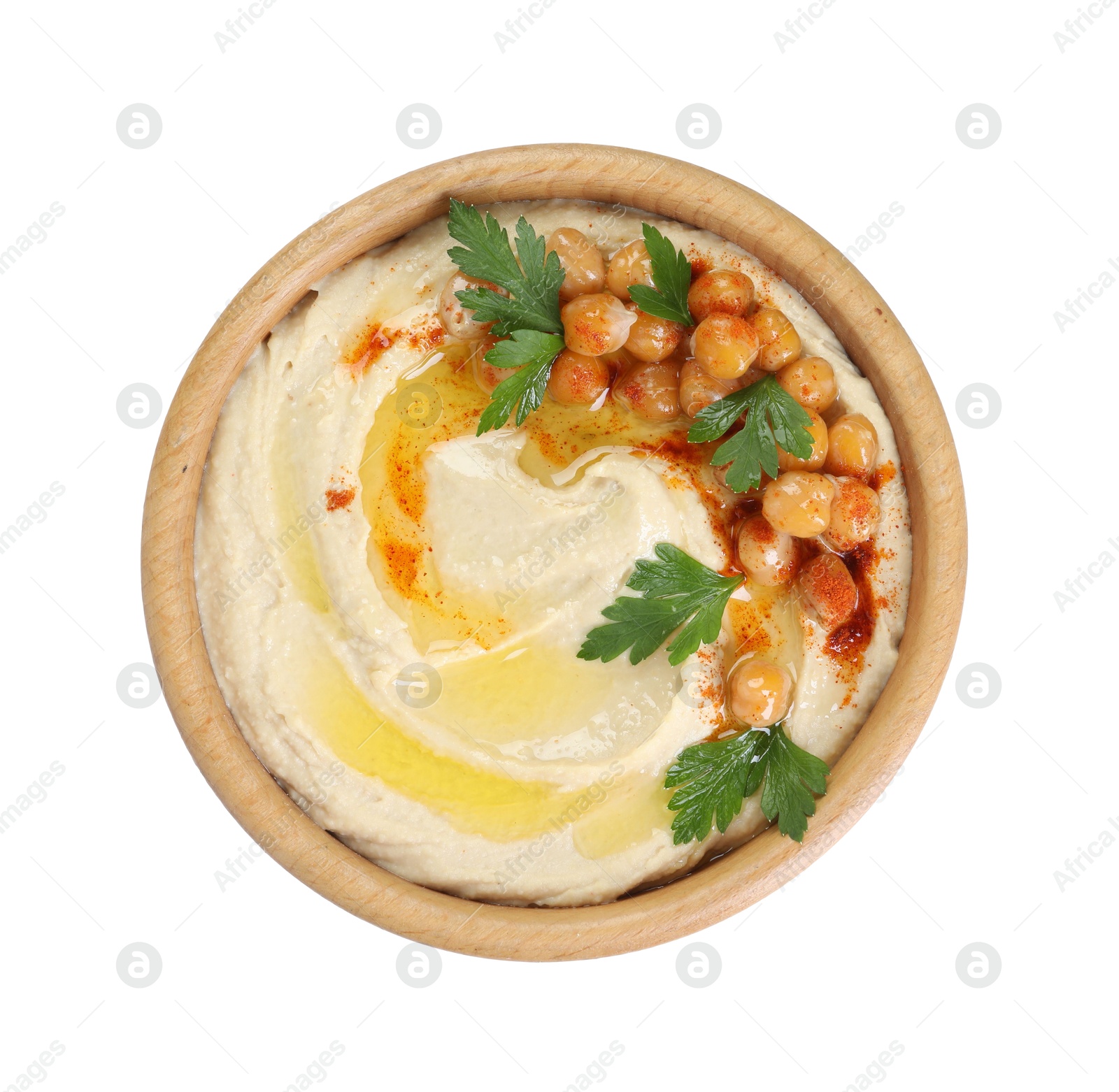 Photo of Delicious hummus with olive oil, chickpeas and parsley isolated on white, top view