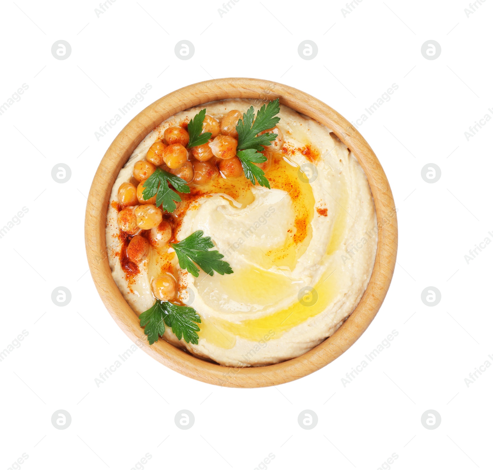 Photo of Delicious hummus with olive oil, chickpeas and parsley isolated on white, top view