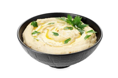 Photo of Delicious hummus with olive oil and parsley isolated on white