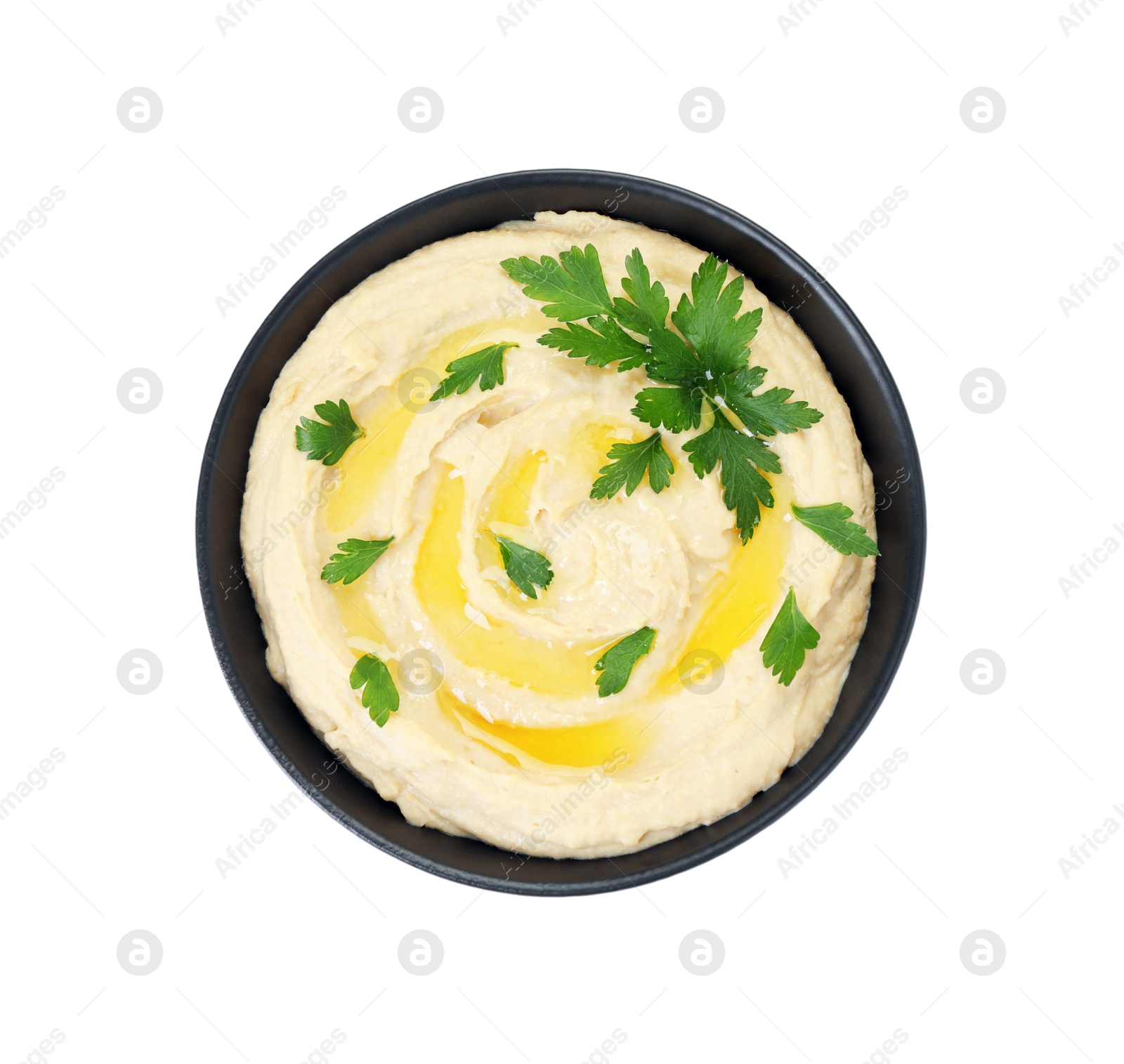 Photo of Delicious hummus with olive oil and parsley isolated on white, top view