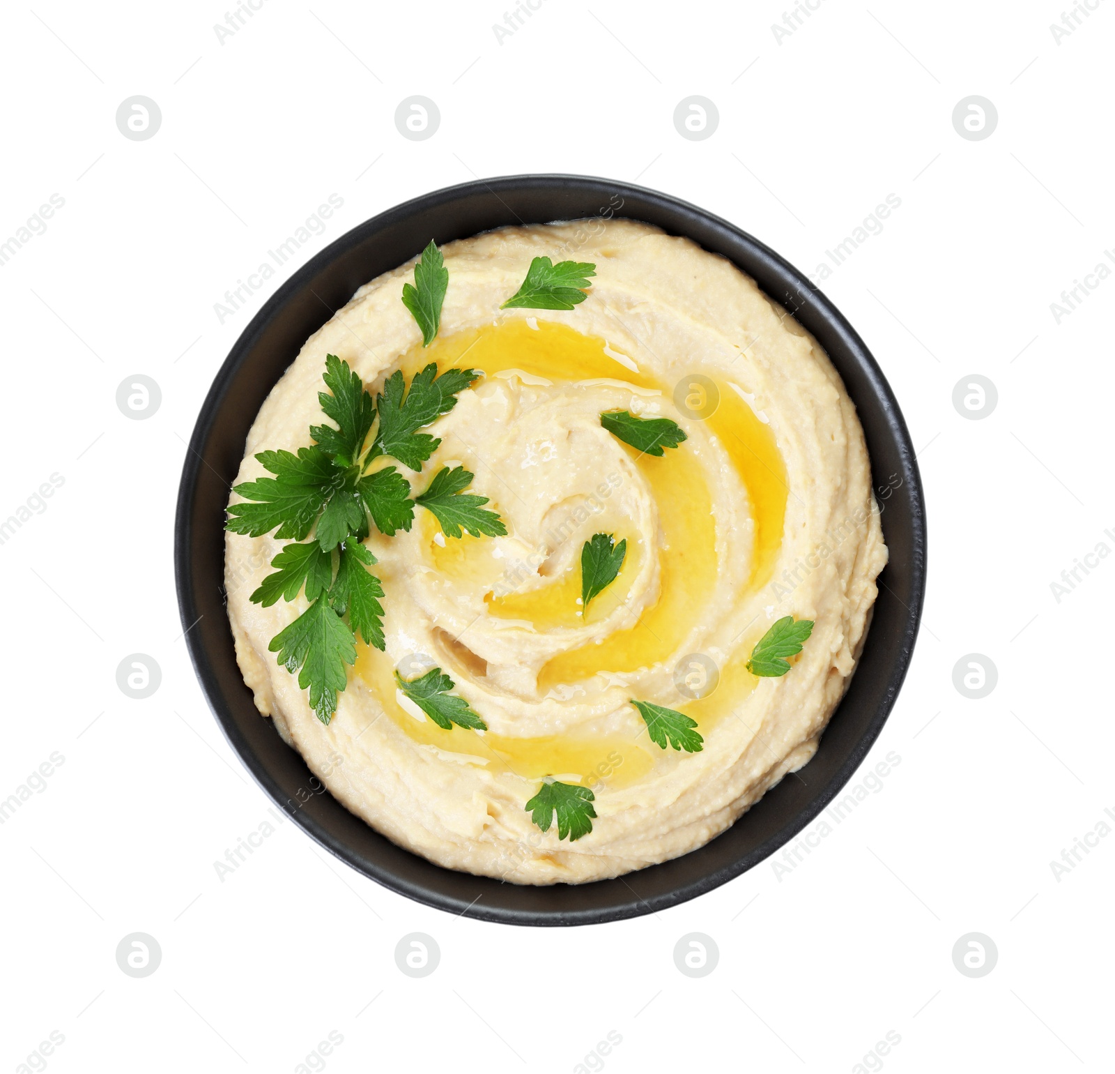 Photo of Delicious hummus with olive oil and parsley isolated on white, top view