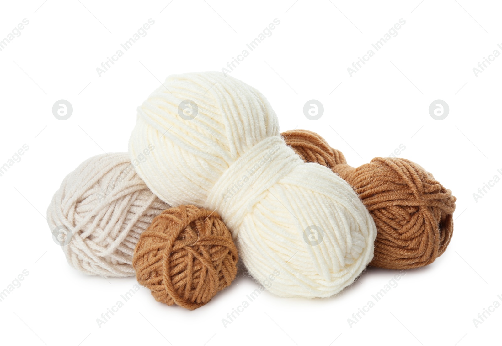 Photo of Skeins of soft yarn for knitting isolated on white