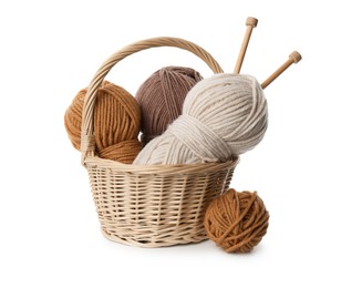 Photo of Skeins of soft yarn and knitting needles isolated on white