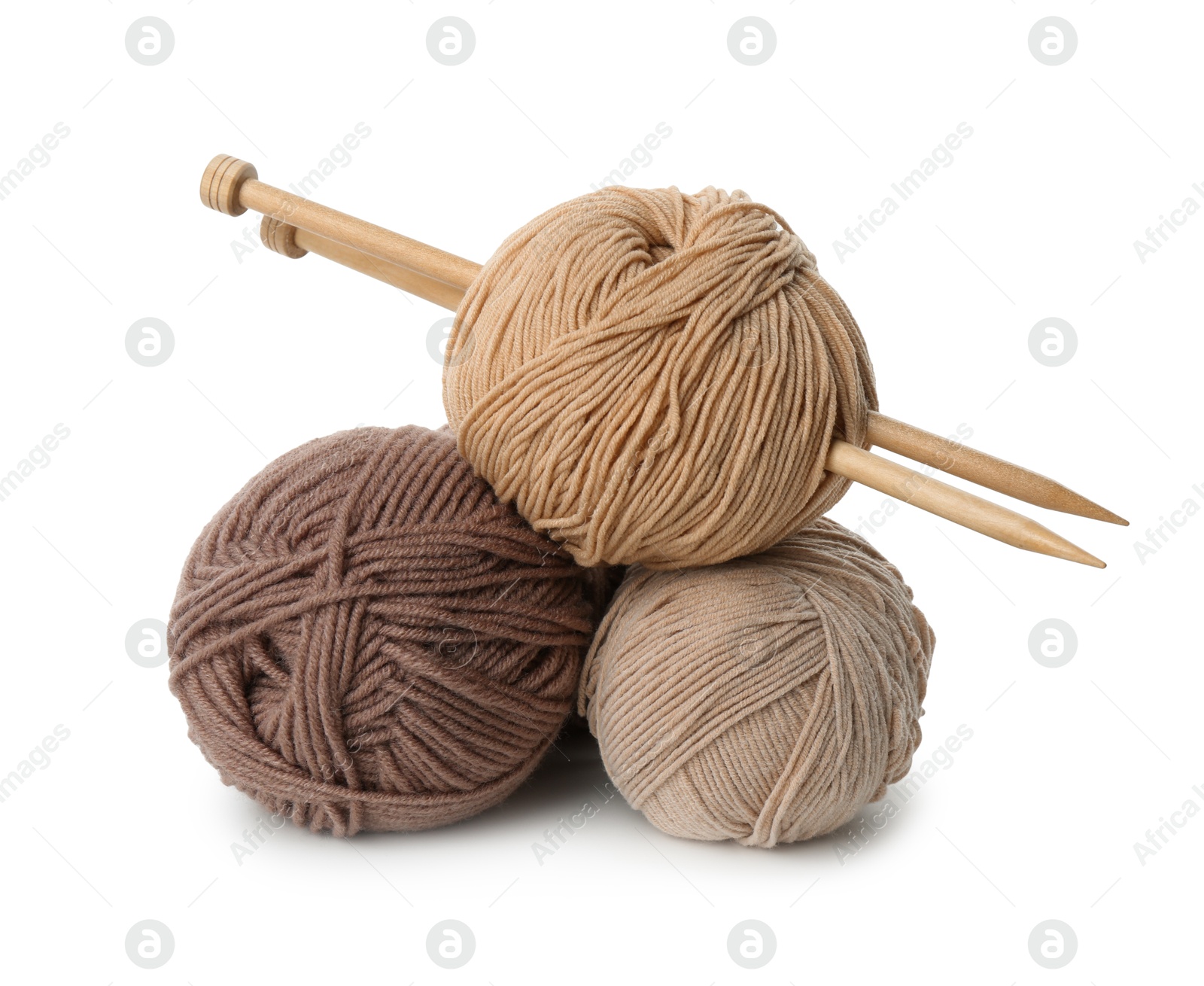 Photo of Skeins of soft yarn and knitting needles isolated on white