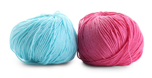 Pink and light blue yarns isolated on white