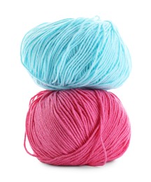 Pink and light blue yarns isolated on white