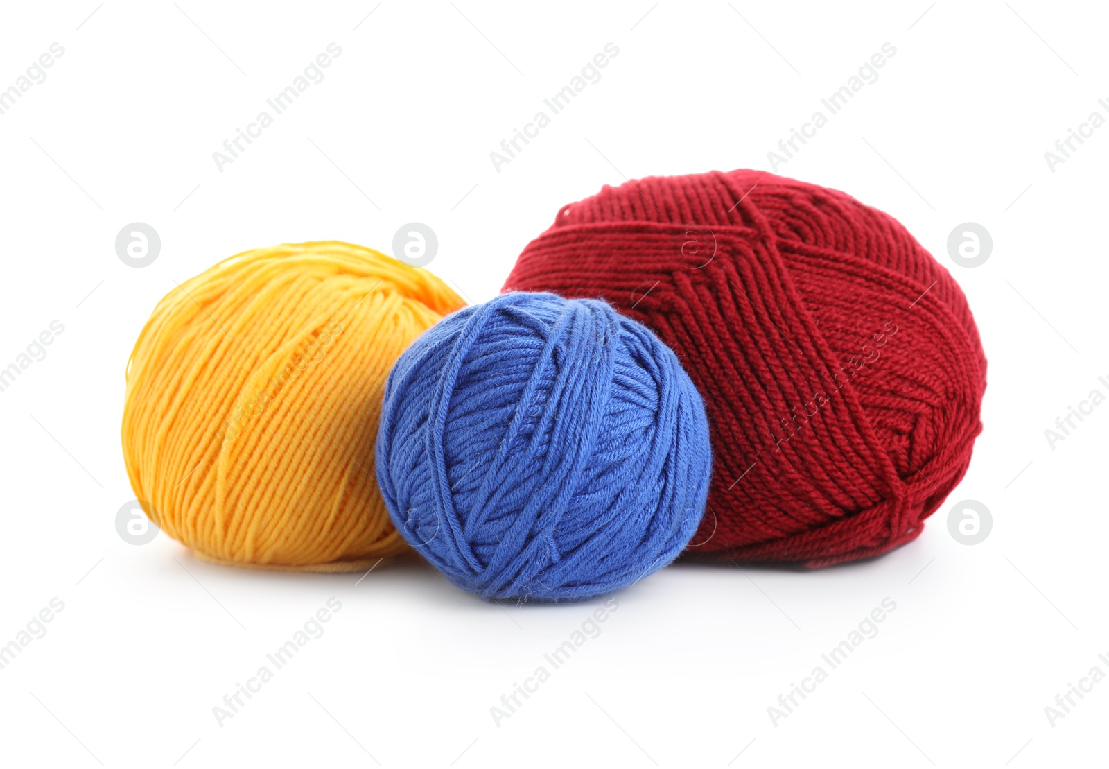 Photo of Many different bright yarns isolated on white