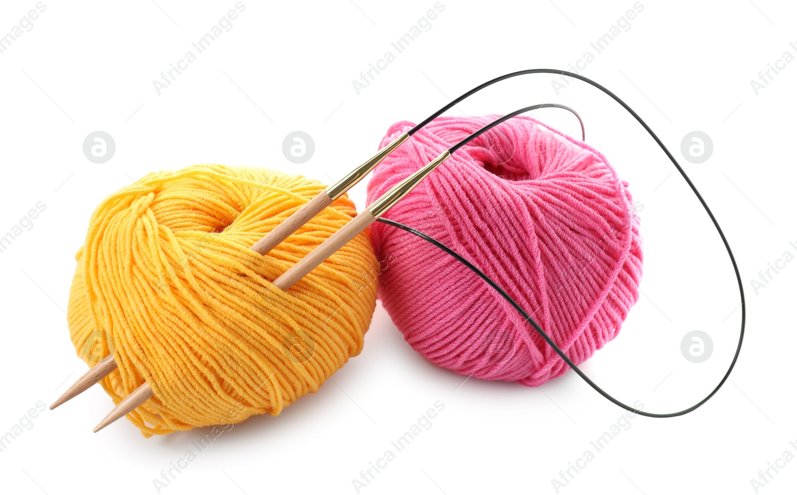 Photo of Two bright yarns and knitting needles isolated on white