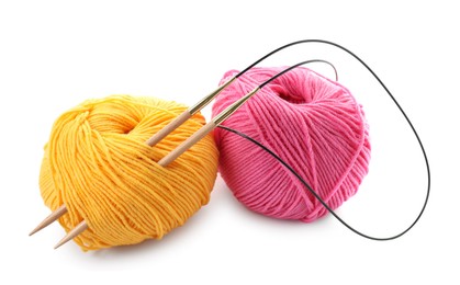 Photo of Two bright yarns and knitting needles isolated on white