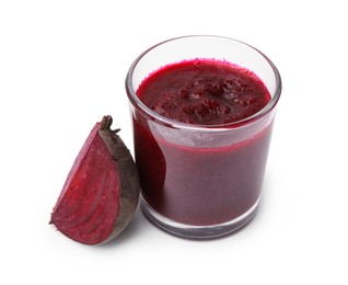 Tasty beetroot smoothie in glass and piece of fresh vegetable isolated on white. Vegan drink