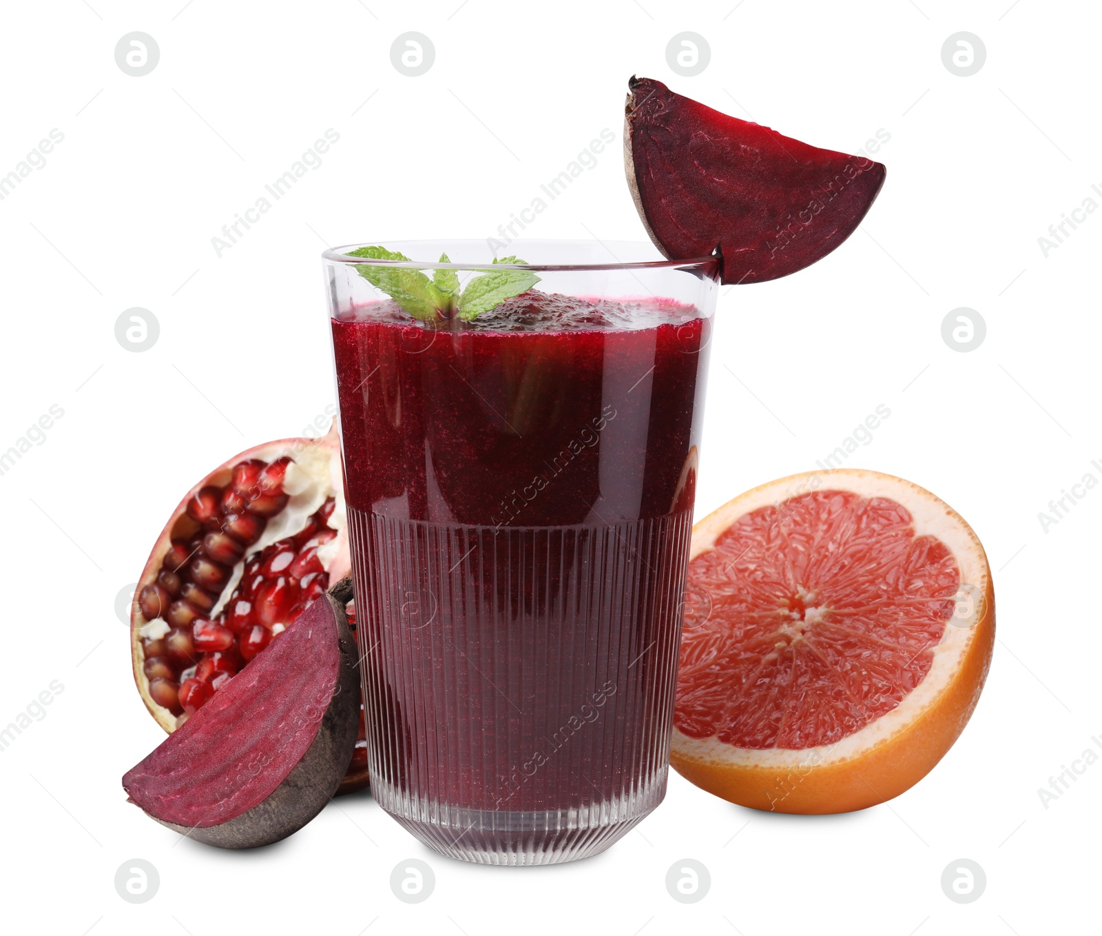 Photo of Tasty beetroot smoothie with mint in glass, fresh vegetables and fruits isolated on white. Vegan drink