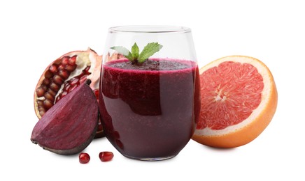 Photo of Tasty beetroot smoothie with mint in glass, fresh vegetable and fruits isolated on white. Vegan drink