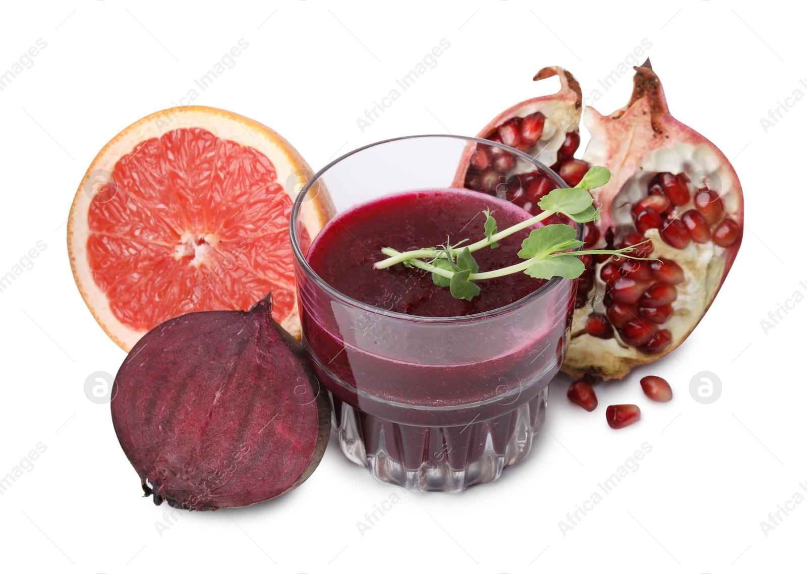 Photo of Tasty beetroot smoothie with microgreens in glass, fresh vegetable and fruits isolated on white. Vegan drink