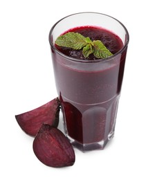 Fresh beetroot smoothie and mint in glass isolated on white