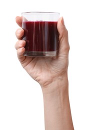 Photo of Woman holding glass of fresh beetroot smoothie isolated on white, closeup