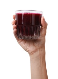 Woman holding glass of fresh beetroot smoothie isolated on white, closeup