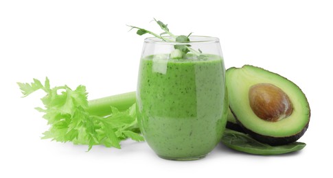 Photo of Tasty green smoothie in glass , avocado and celery isolated on white