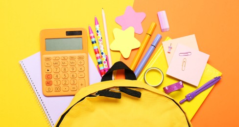 Photo of Backpack and different school stationery on color background, flat lay