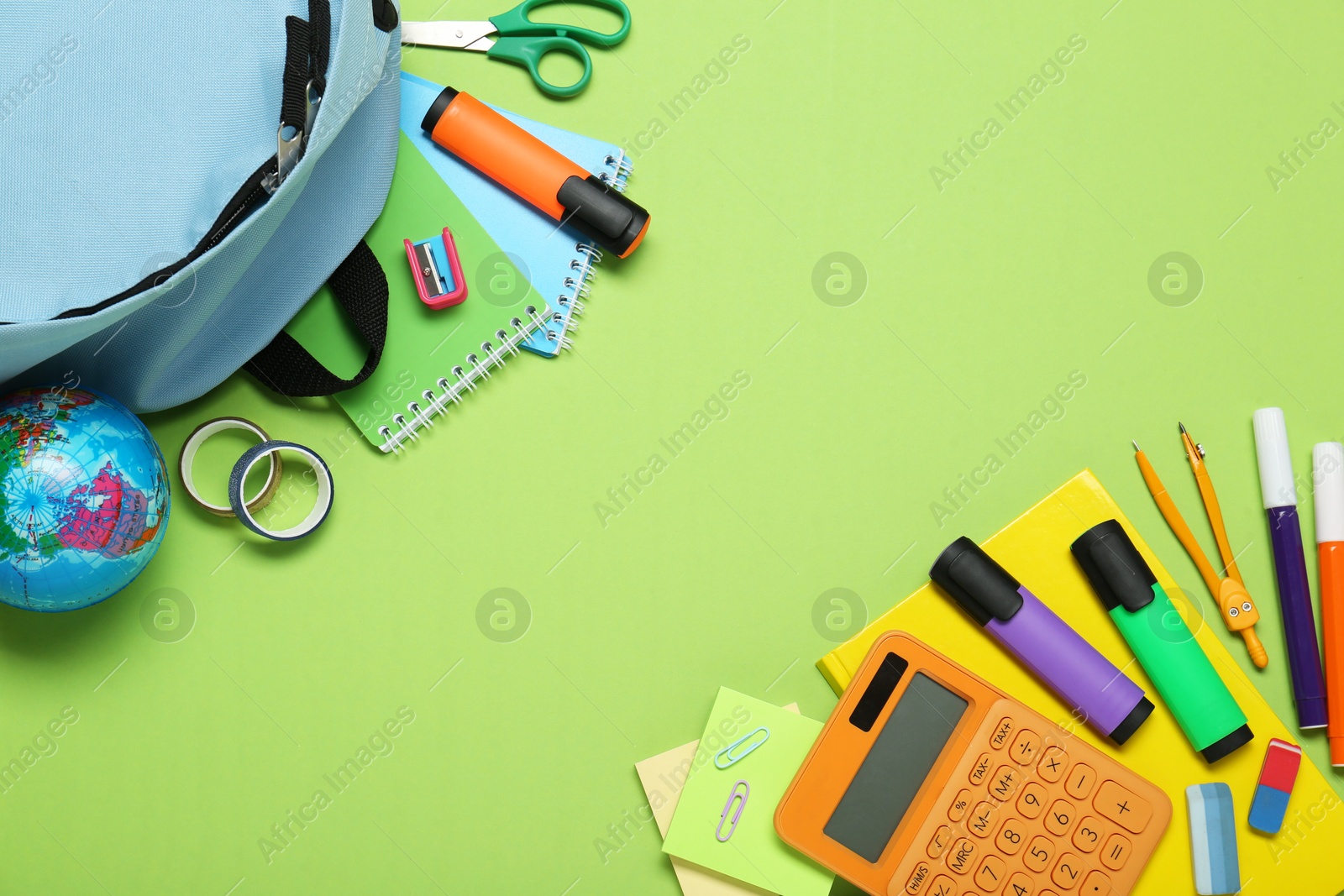 Photo of Backpack and different school stationery on light green background, flat lay. Space for text