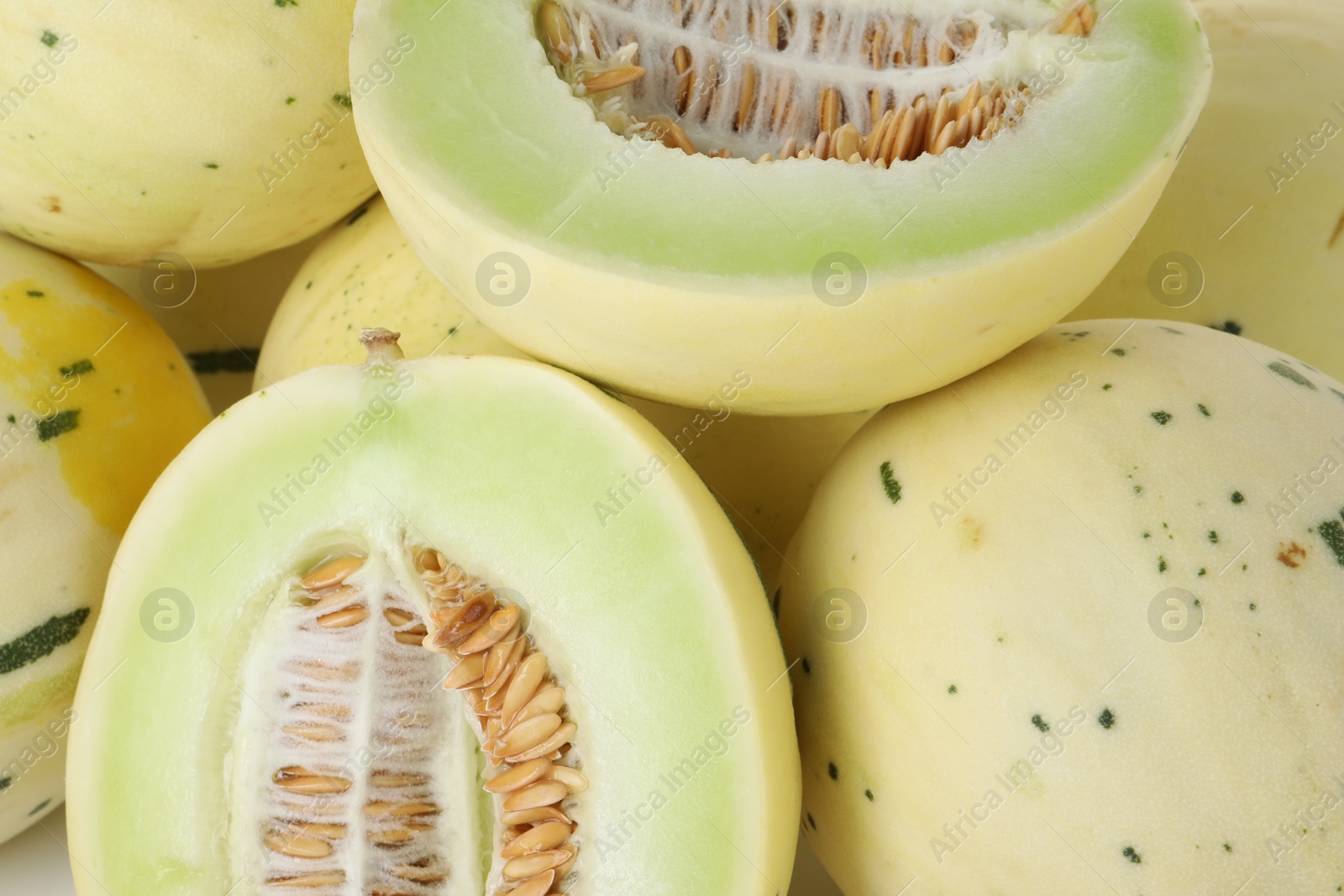 Photo of Fresh ripe honeydew melons as background, closeup