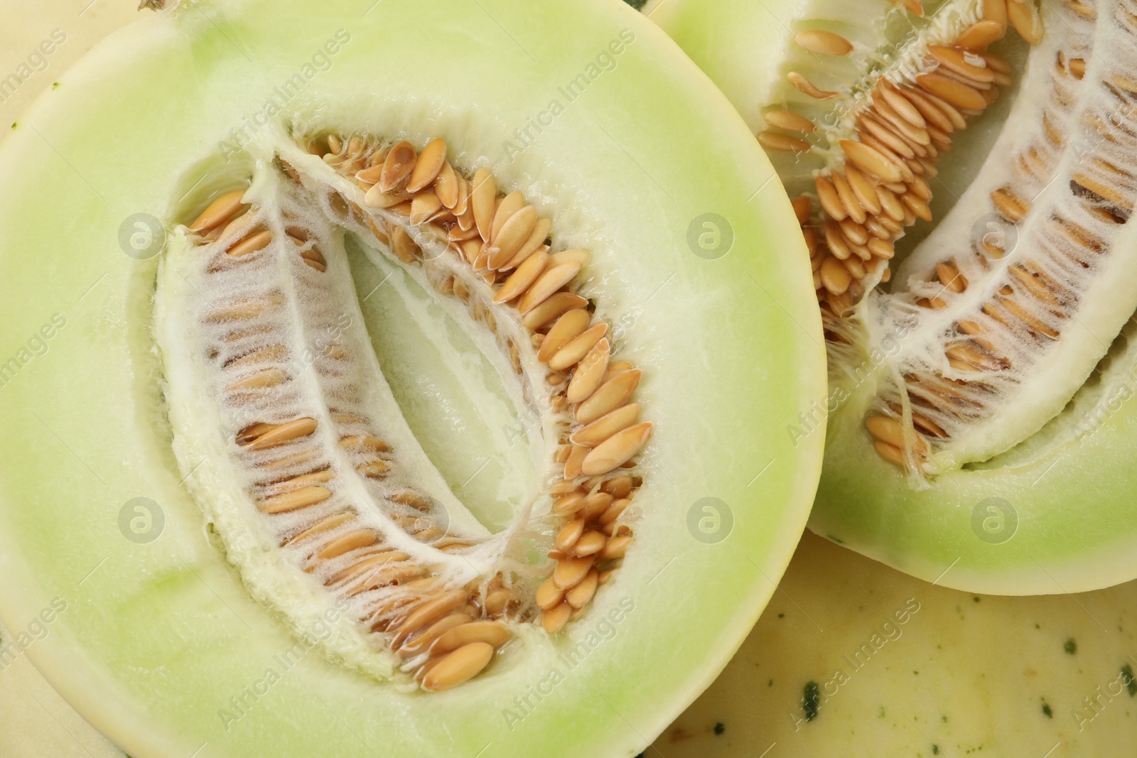 Photo of Fresh ripe honeydew melons as background, closeup