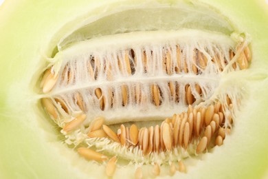 Photo of Cut fresh ripe honeydew melon as background, closeup