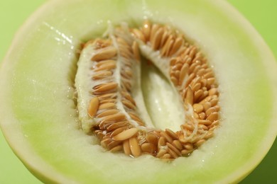 Photo of Half of fresh ripe honeydew melon, closeup