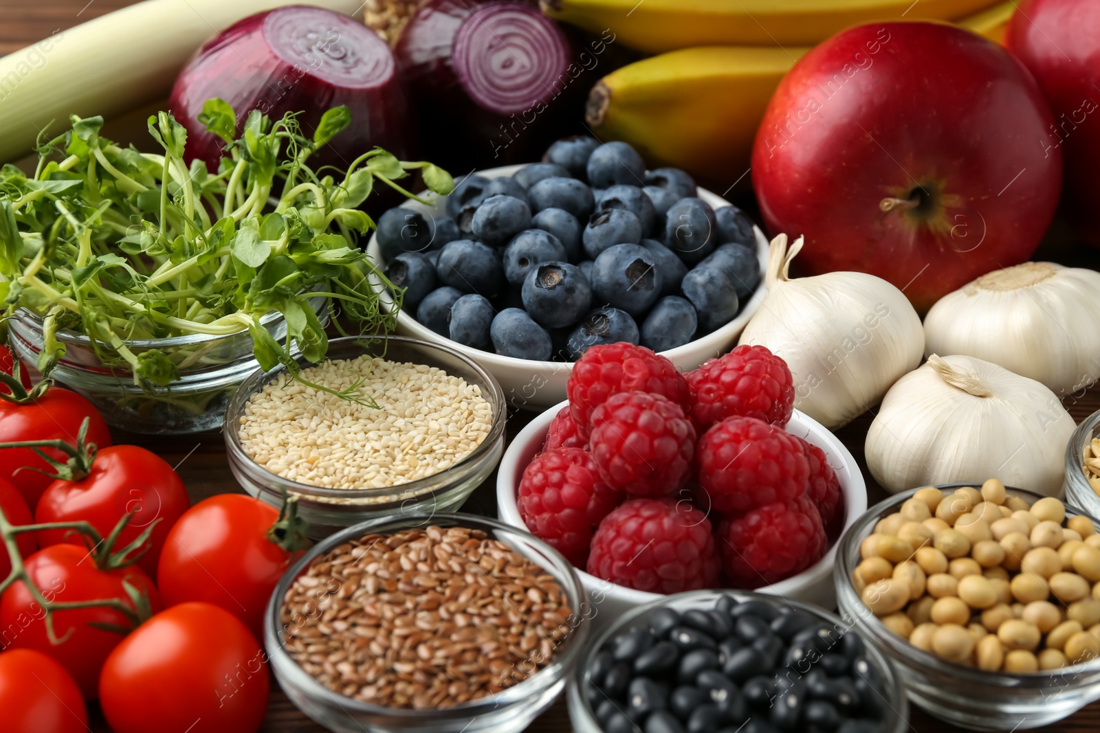 Photo of Different fresh products on table, closeup. Source of prebiotics