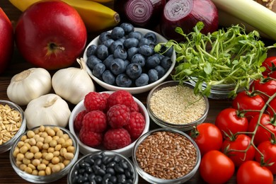 Photo of Different fresh products on table, closeup. Source of prebiotics