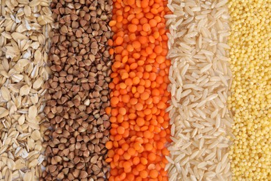 Photo of Different grains and cereals as background, top view