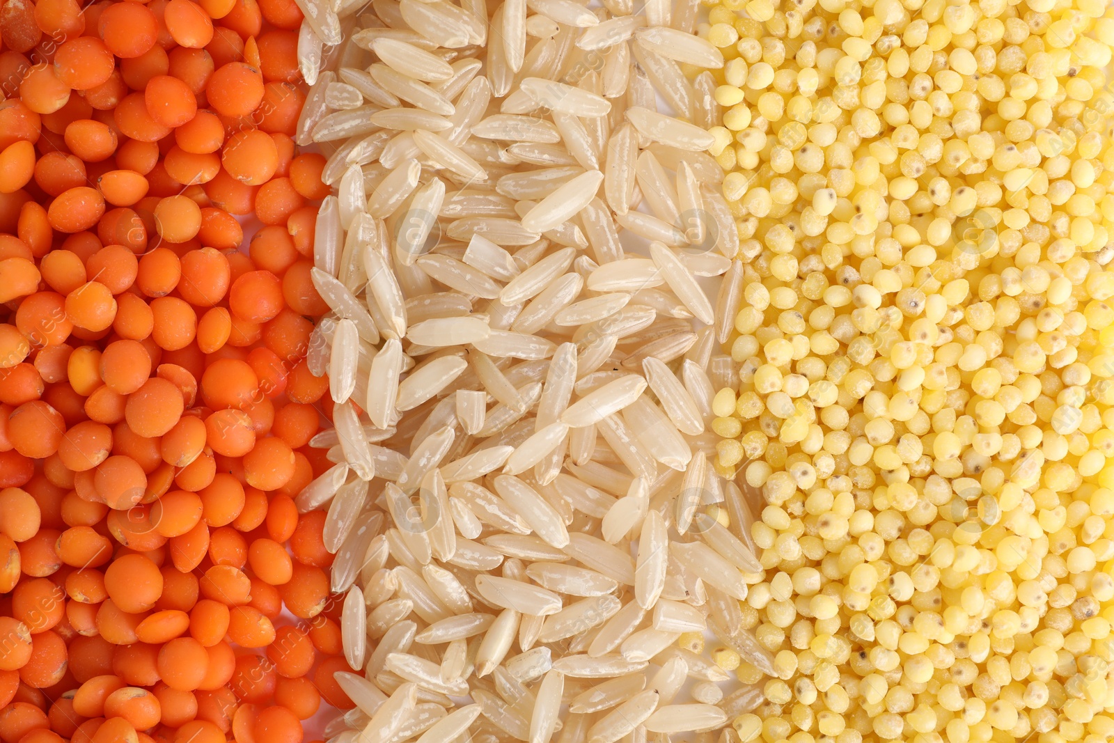 Photo of Different grains and cereals as background, top view