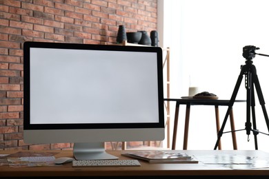 Photo of Shooting food in photo studio with professional equipment, focus on computer