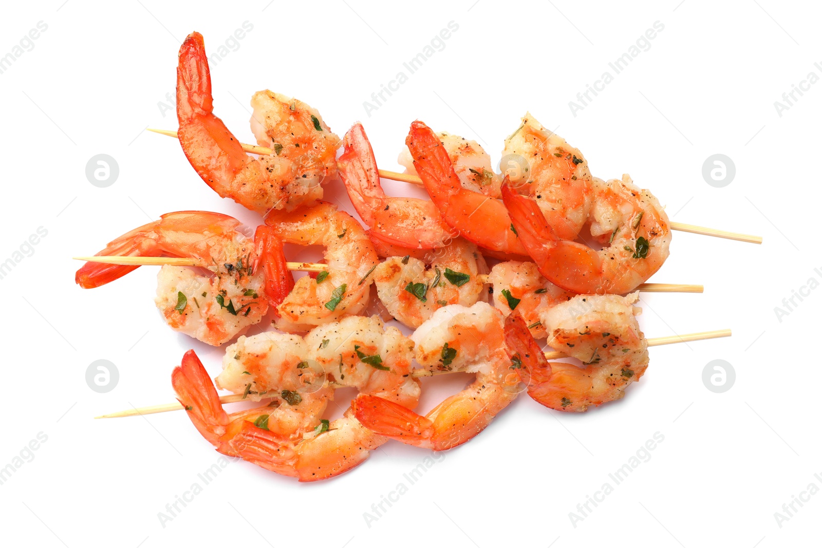 Photo of Skewers with delicious grilled shrimps isolated on white, top view