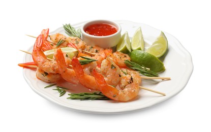 Photo of Skewers with delicious grilled shrimps, lime and sauce isolated on white