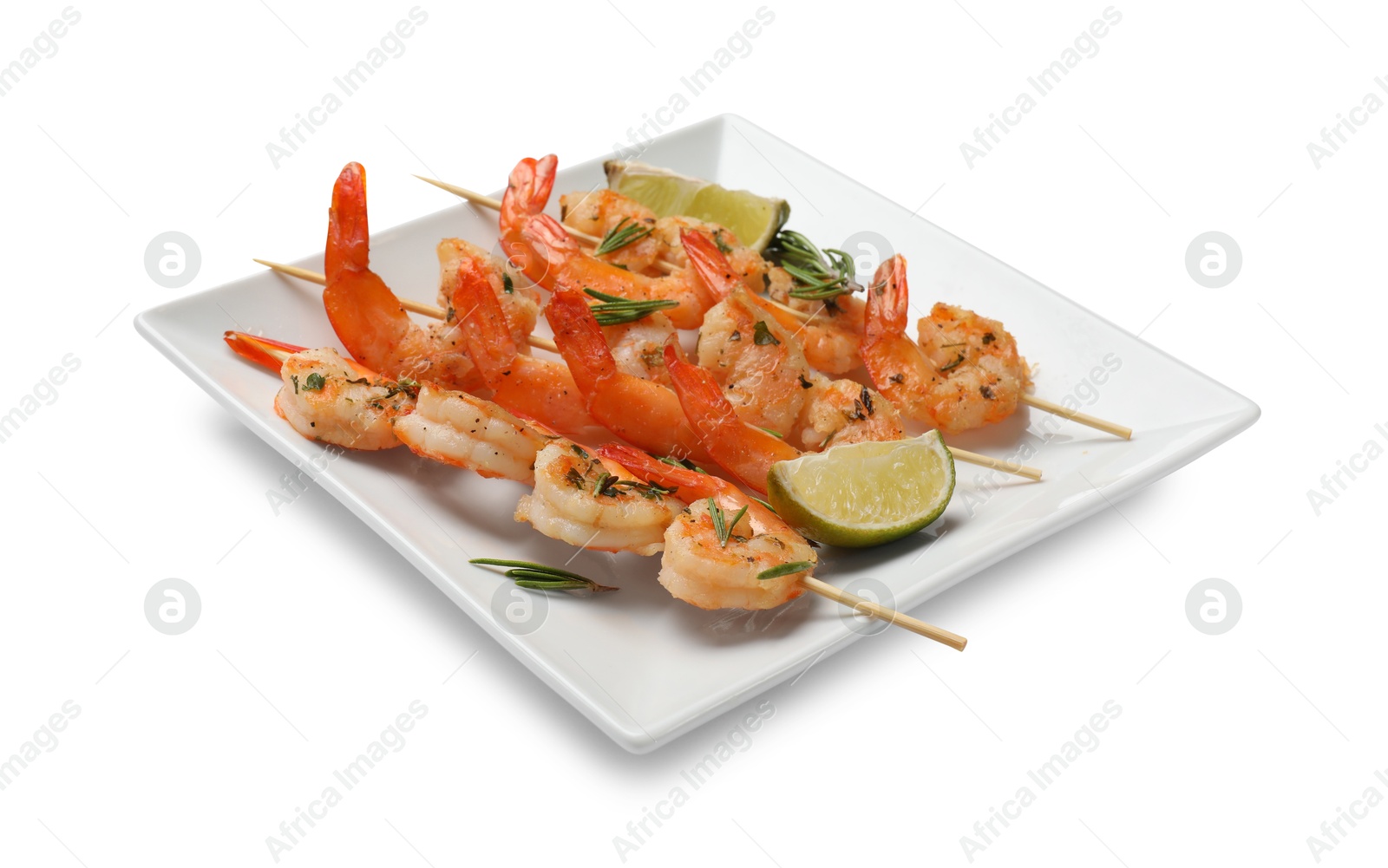 Photo of Skewers with delicious grilled shrimps and lime isolated on white