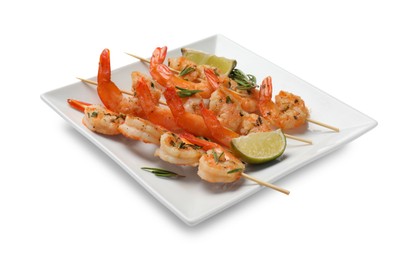 Photo of Skewers with delicious grilled shrimps and lime isolated on white