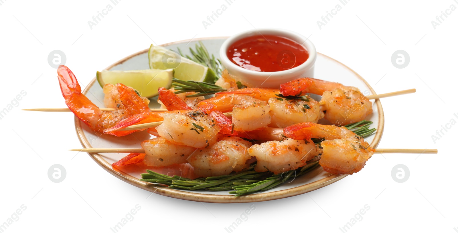 Photo of Delicious grilled shrimp skewers with sauce and lime isolated on white