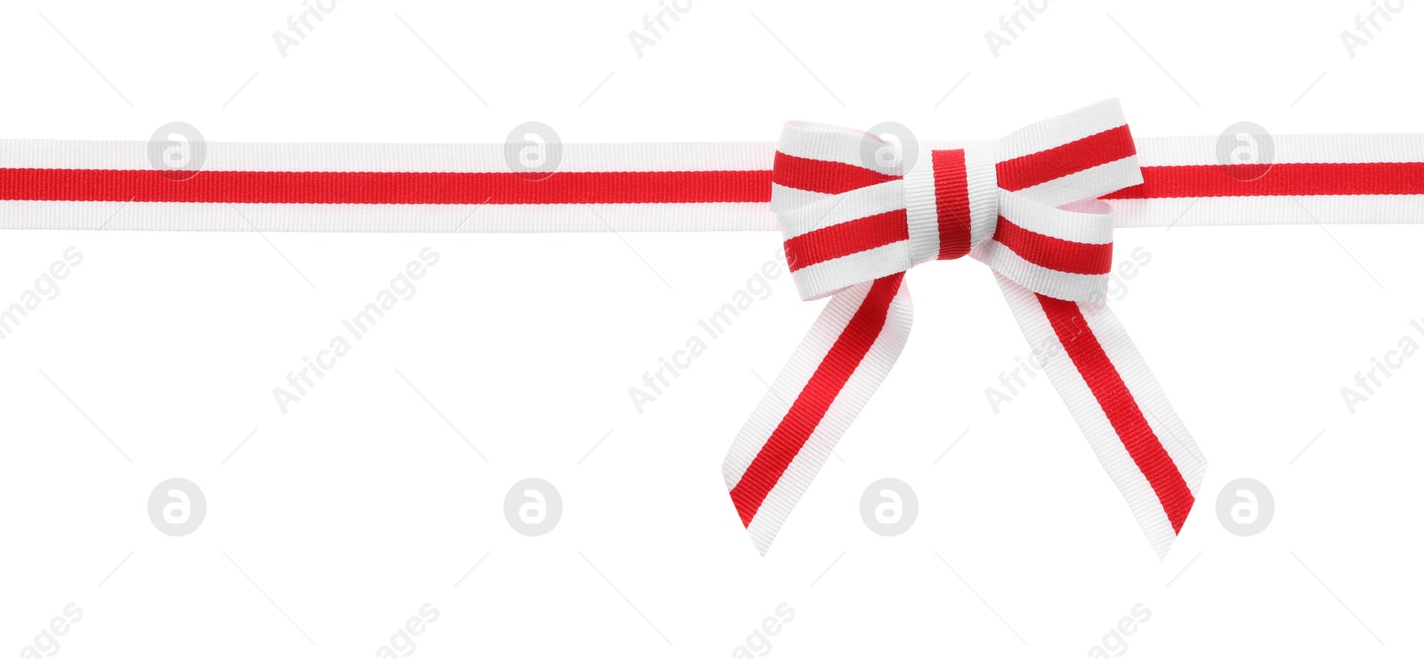 Photo of Colorful striped ribbon with bow isolated on white