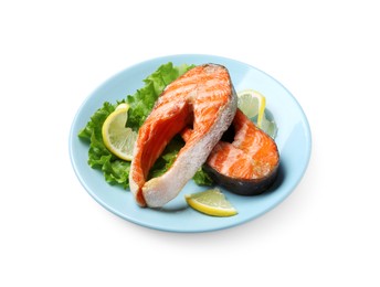 Photo of Tasty grilled salmon steaks, lettuce and lemon isolated on white