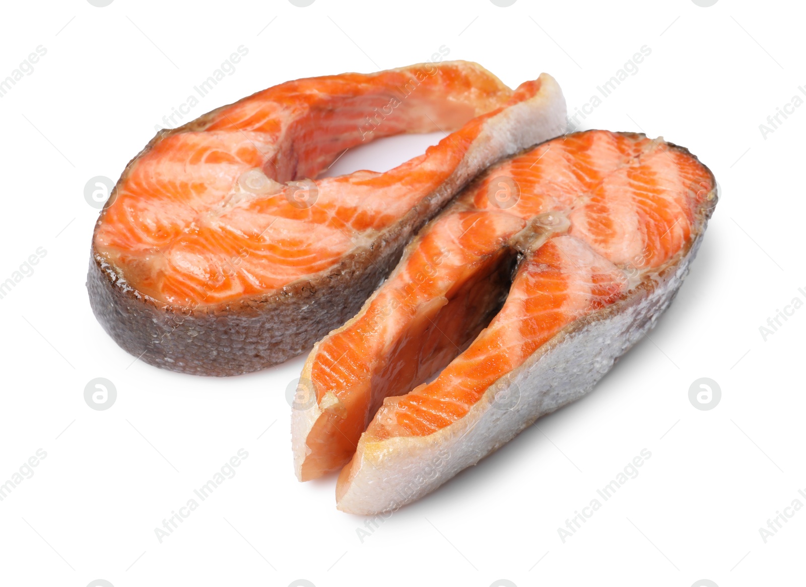 Photo of Tasty grilled salmon steaks isolated on white