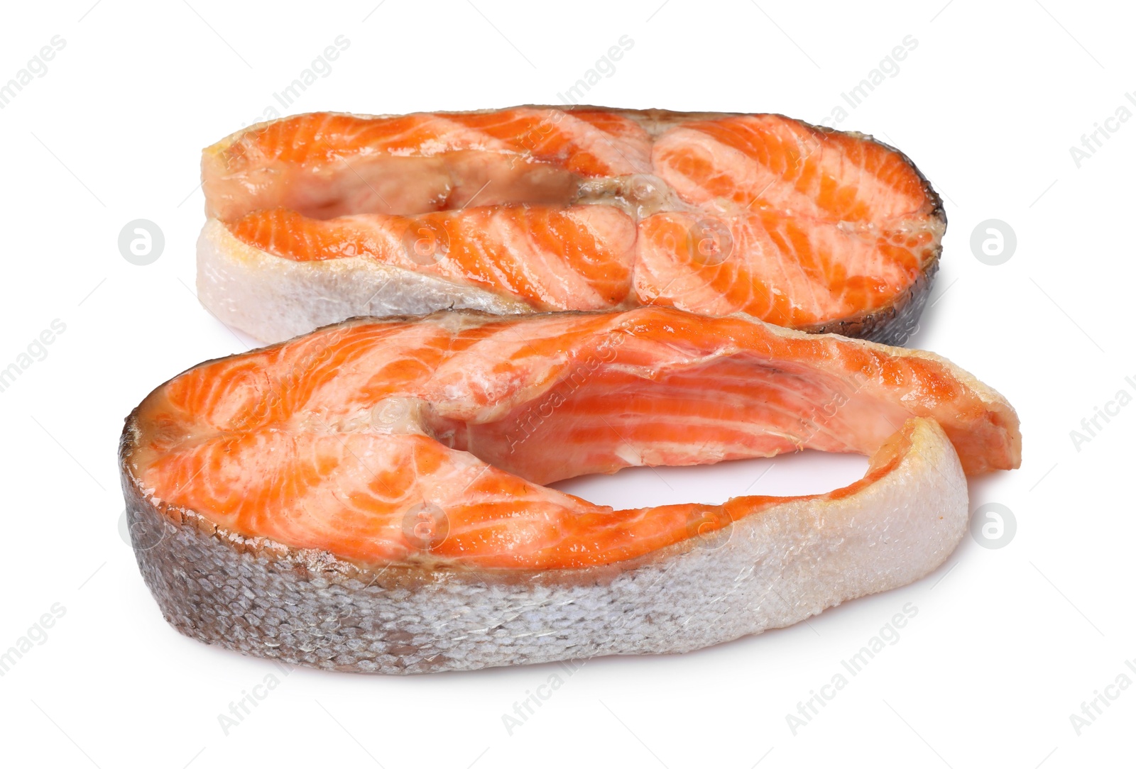 Photo of Tasty grilled salmon steaks isolated on white