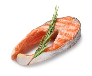 Photo of Tasty grilled salmon steak and rosemary isolated on white