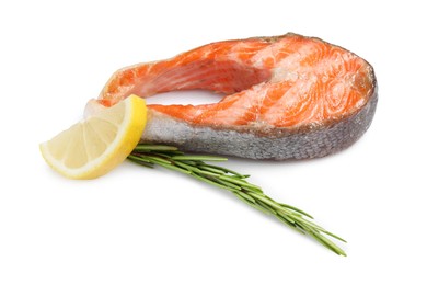 Photo of Tasty grilled salmon steak, lemon and rosemary isolated on white