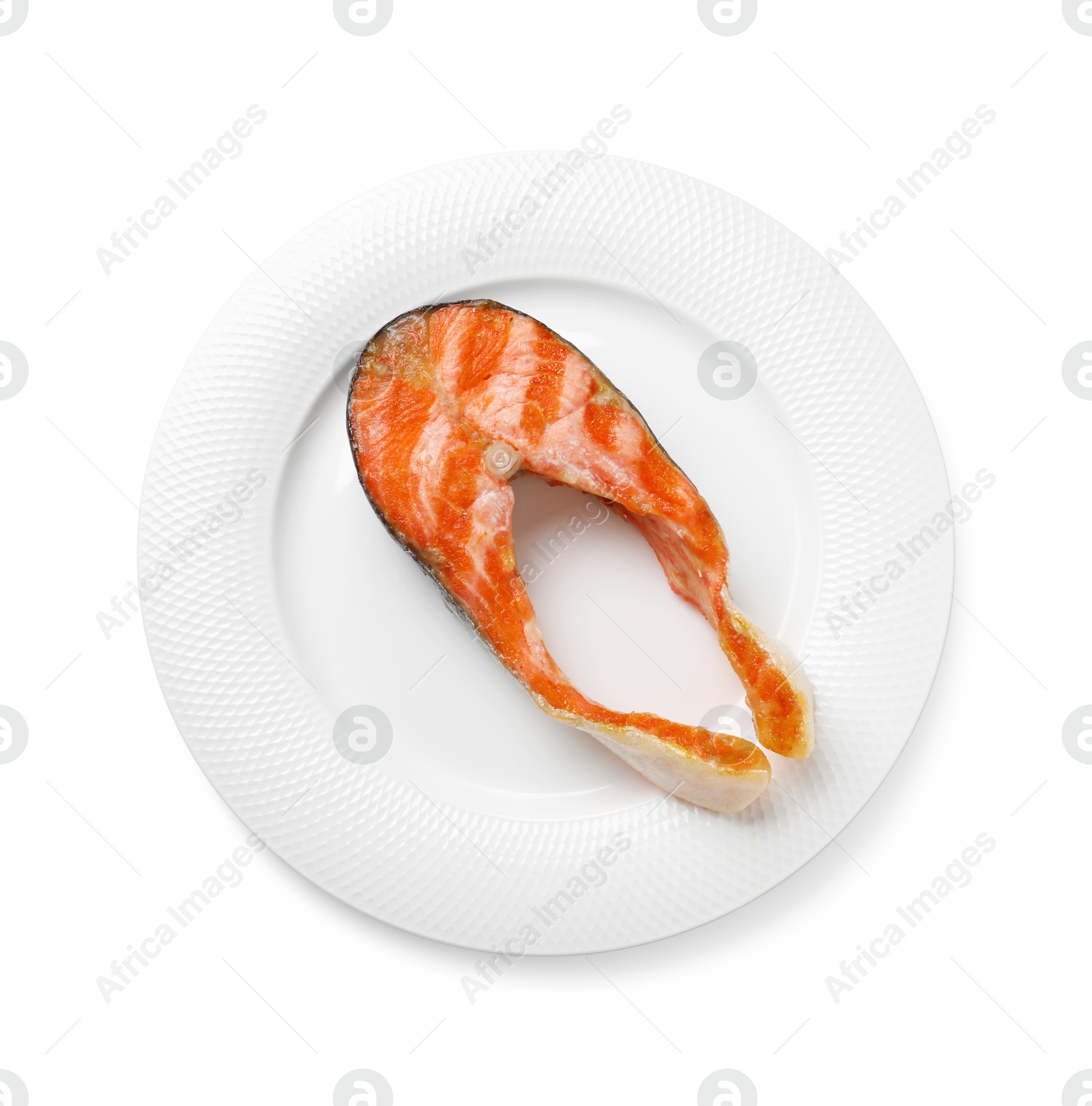 Photo of Tasty grilled salmon steak isolated on white, top view