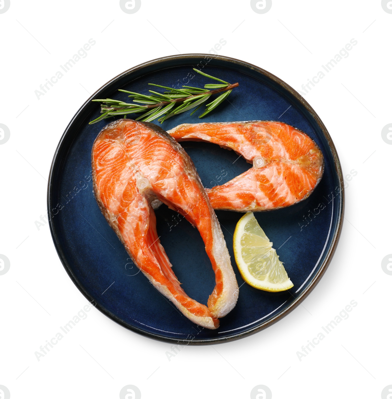 Photo of Tasty grilled salmon steaks, lemon and rosemary isolated on white, top view