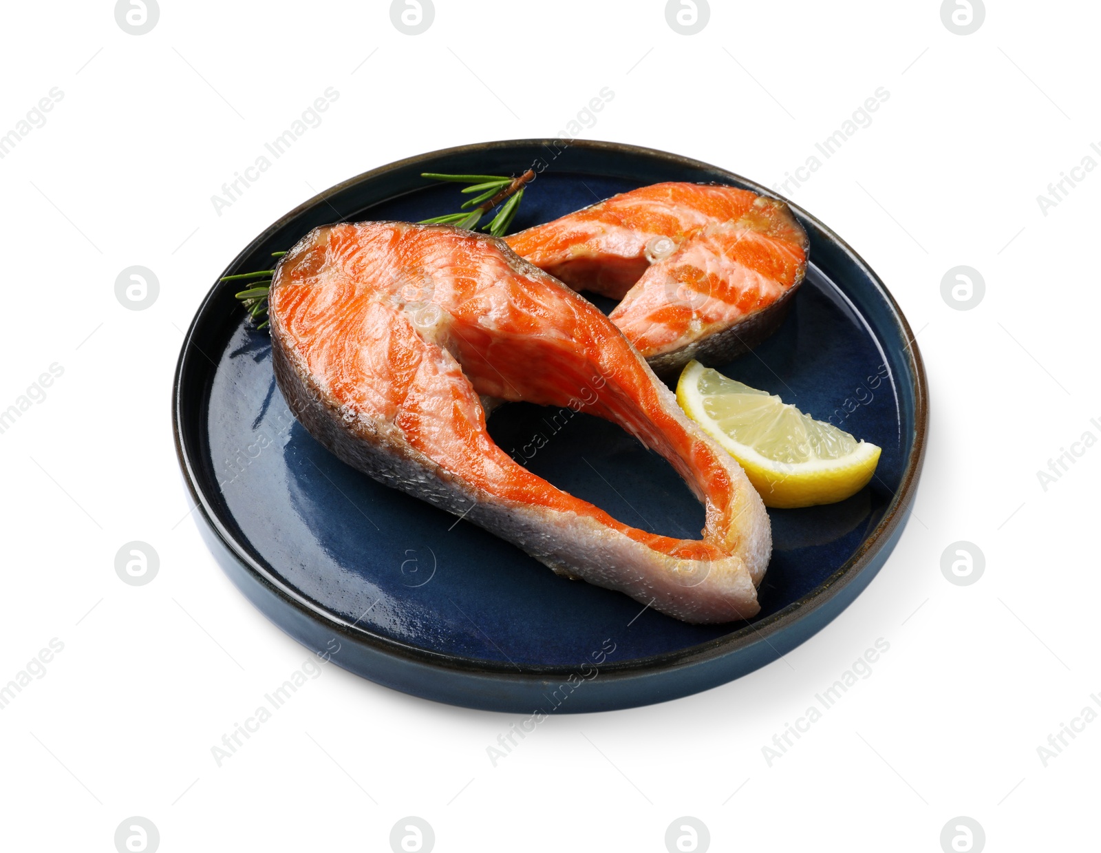 Photo of Tasty grilled salmon steaks, lemon and rosemary isolated on white