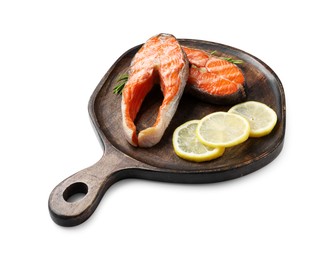 Photo of Tasty grilled salmon steaks, lemon and rosemary isolated on white