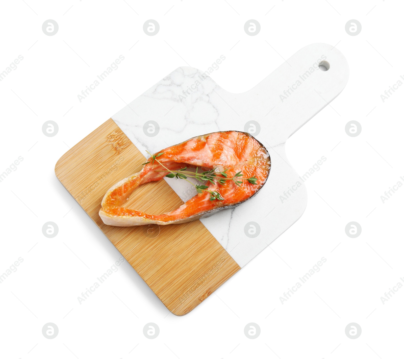 Photo of Tasty grilled salmon steak and thyme isolated on white, top view