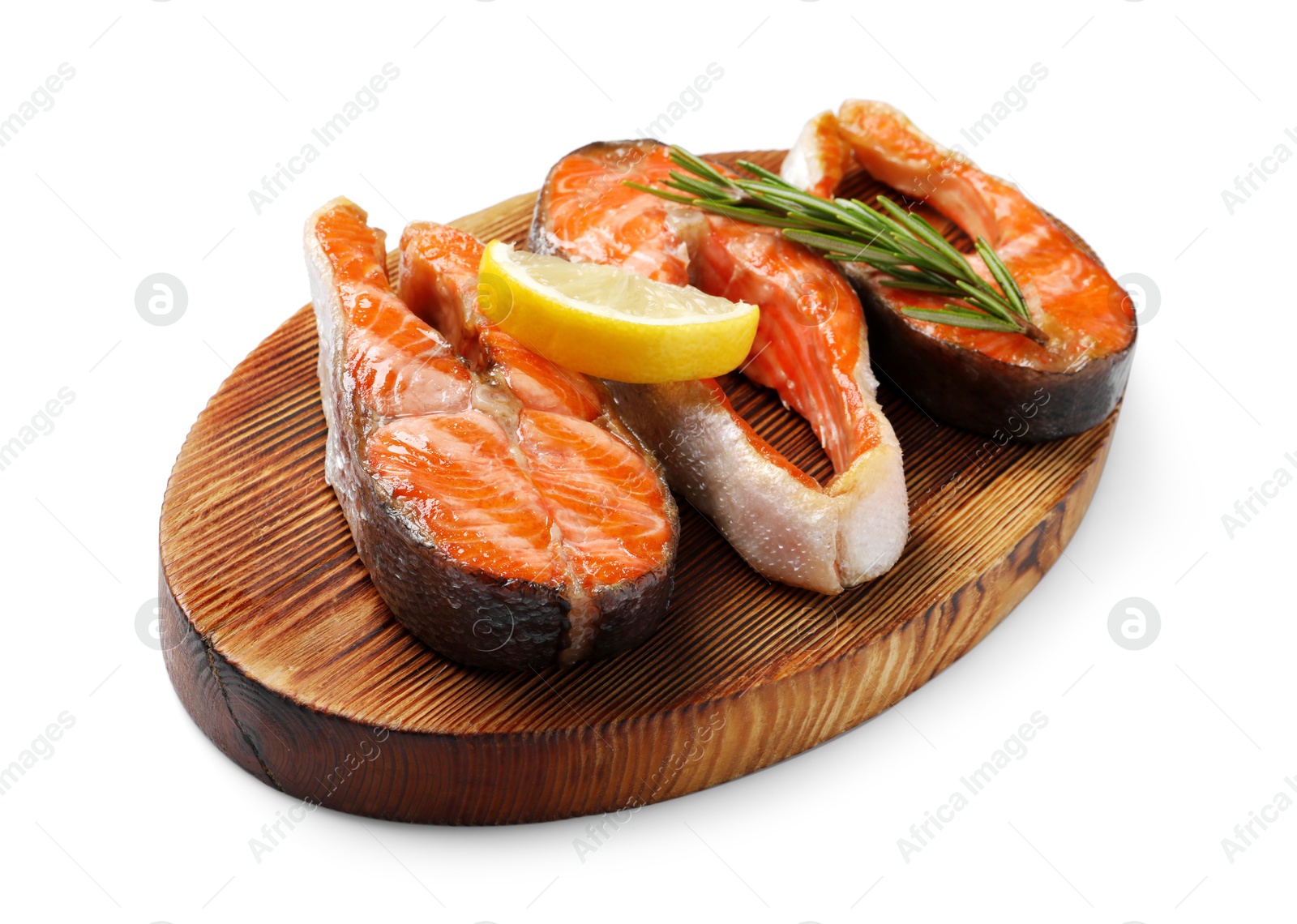 Photo of Tasty grilled salmon steaks, lemon and rosemary isolated on white